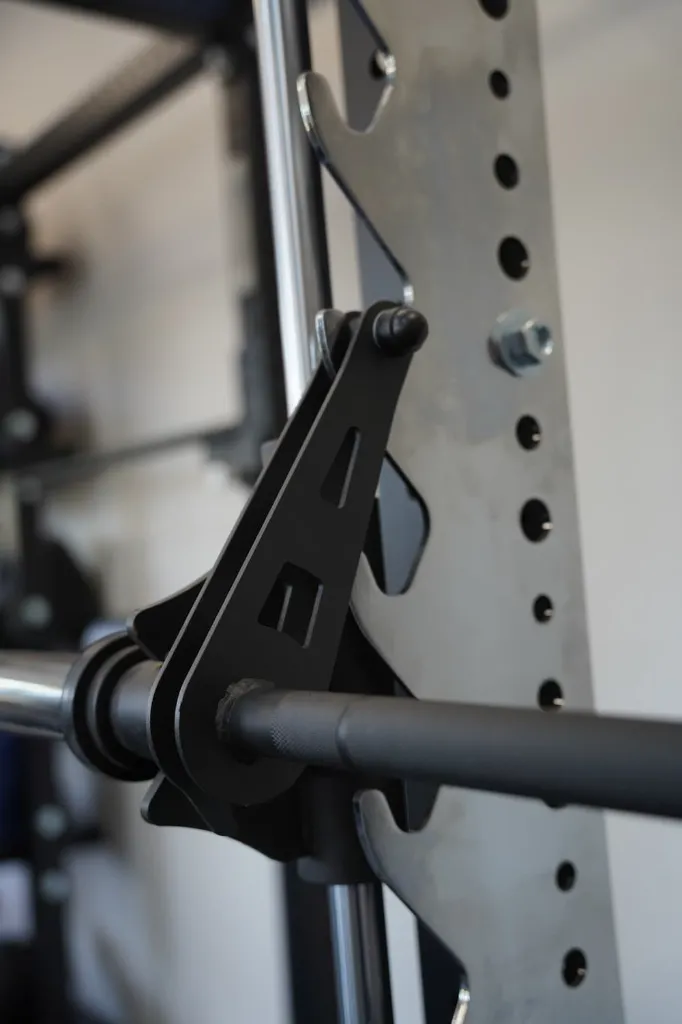 Comment se placer à la smith machine ? Quels muscles travaillent la smith machine ?